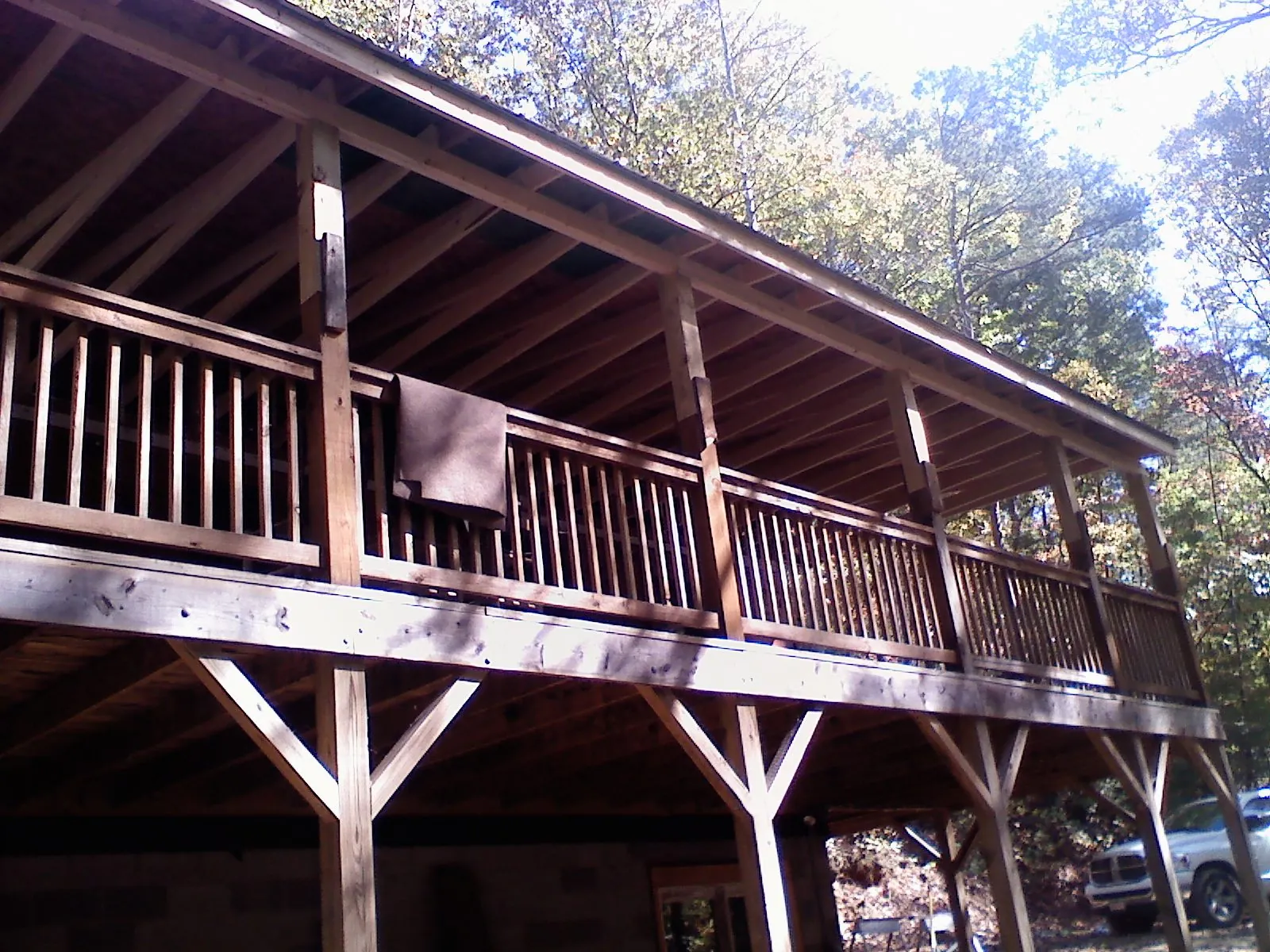 Timber framing under a new elevated porch and deck — Roof Leak Repair in Muskego by Roofing Brothers